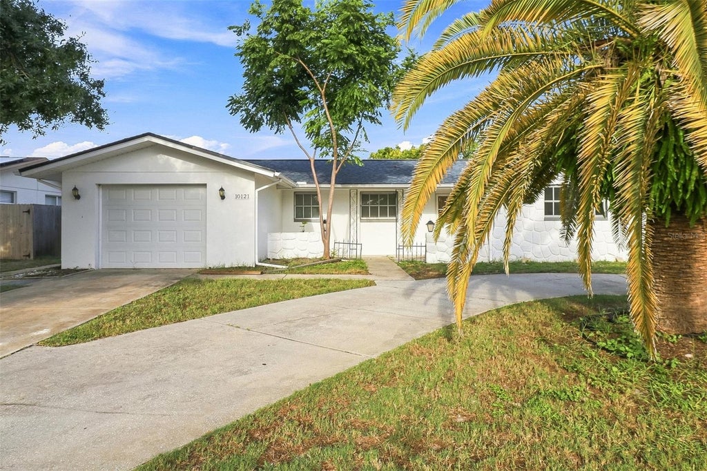 Photo of 10121 Oleander Drive, Port Richey, FL 34668 (MLS # O6448451)