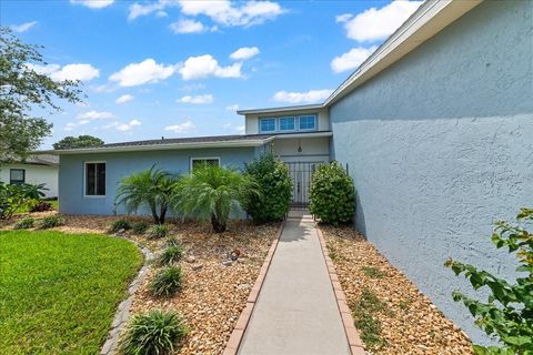 Photo of 720 Wing Foot Lane, Melbourne, FL 32940 (MLS # O6340272) Photo of 720 Wing Foot Lane, Melbourne, FL 32940 (MLS # O6340272)