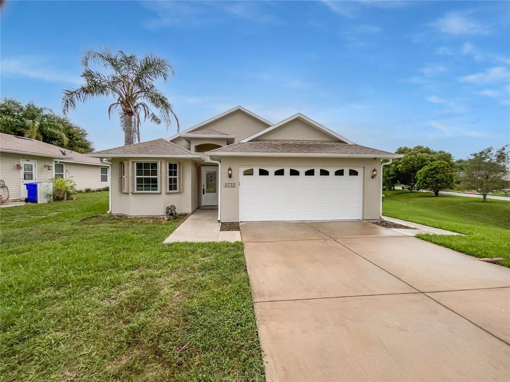 Photo of 2732 Boardwalk Way, Tavares, FL 32778 (MLS # O6351374)