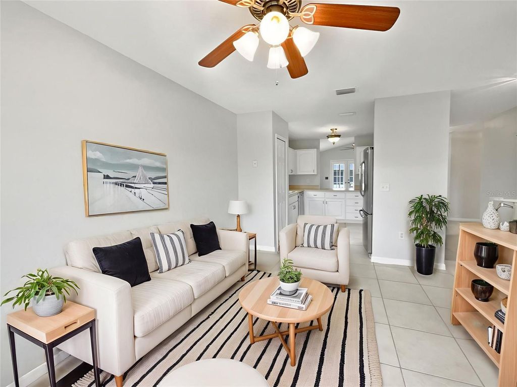Photo of 2732 Boardwalk Way, Tavares, FL 32778 (MLS # O6351374)