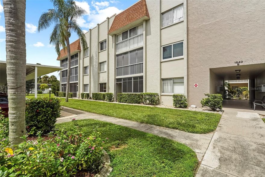 Welcome to Glen Oaks, a sought-after 55+ community! This spacious ground-level residence offers 2 bedrooms and 2 bathrooms, featuring a blend of tile and luxury vinyl flooring throughout. Most rooms were tastefully renovated in 2020, with the guest bathroom receiving a stylish update in 2023. Enjoy the convenience of reserved covered parking along with an additional bonus outdoor covered area—perfect for relaxing. Plus, you will find additional storage just across the hall as well as the nearby laundry room. The lanai was also re-screened in 2022, providing a fresh and inviting space to enjoy the Florida lifestyle. With its modern updates, prime location, and vibrant community setting, this home is an ideal choice for comfortable Florida living.