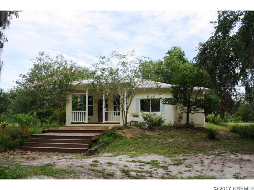 Perfect Home in the Country. Secluded yet close to town this 2 bedroom and Master Jack/Jill bath has amazing character. Built in 2006 concrete block home has beautiful hard wood pine floors through out, 9ft high ceiling, fireplace with Keystone, crown molding, 6" base boards, French doors, hickory counter tops, large pantry, farm house sink and much  more. Outside the property is fenced has a large pond, barn w/ water and electric, storage shed, paver area with in-ground fire-pit and additional extra large concrete slab that can be used for anything. This property is a gem.