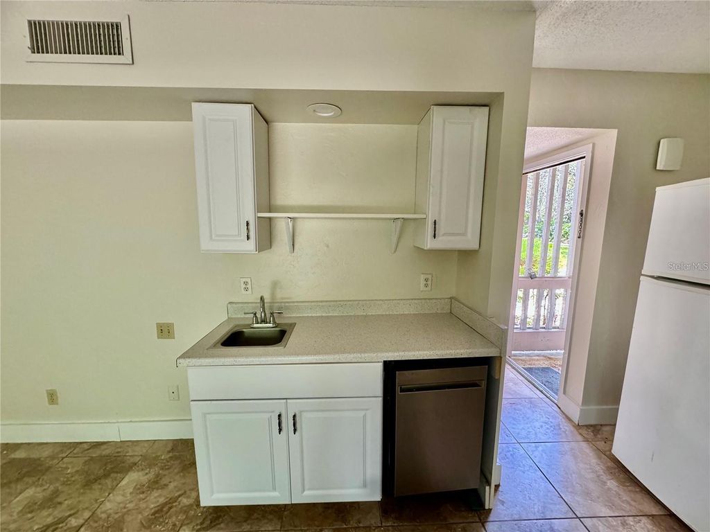 Photo of 3353 Camelot Drive #3353, Haines City, FL 33844 (MLS # O6359214)