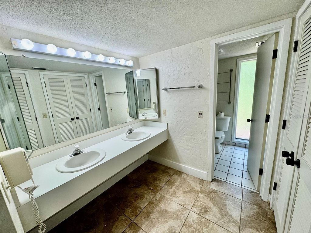 Photo of 3353 Camelot Drive #3353, Haines City, FL 33844 (MLS # O6359214)