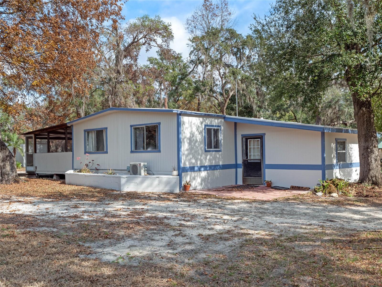 Looking for that Country Retreat on 5 Acres! Look no further this cozy home has been completely renovated and is gated and fenced for privacy. The property features a large pole barn with a car mechanics lift included as well as a carport and several sheds for storage. There is plenty of room to park an RV or enjoy all of your big boy toys. There are large beautiful mature oak trees on the property. There is also room to build your dream home while you live in this current renovated home. Don't let this one pass you by as it is close to the turnpike, shopping and restaurants, however it is in peaceful, quiet country setting. ASK ABOUT THE INCENTIVES WHEN USING OUR PREFERRED LENDER.