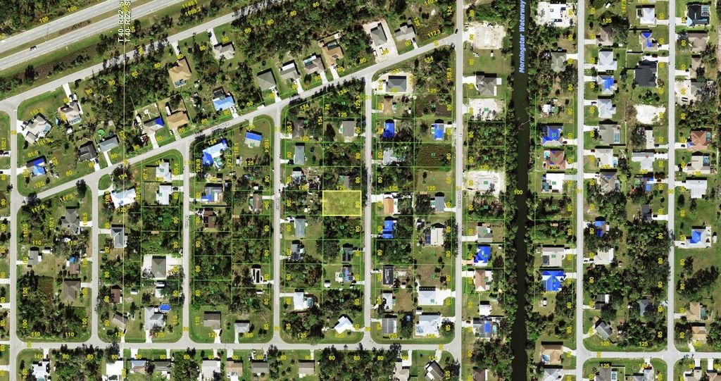 Photo of 279 Ambler Street, Port Charlotte, FL 33954 (MLS # C7521120)