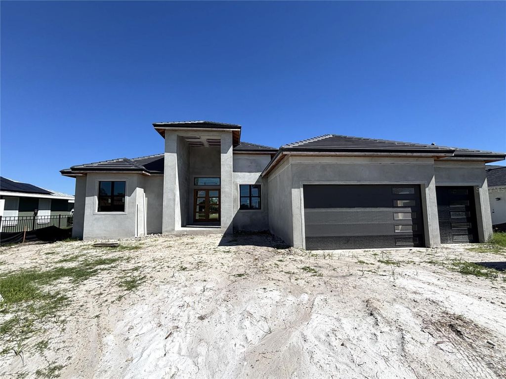 Photo of 215 Bunker Road, Rotonda West, FL 33947 (MLS # O6352684)