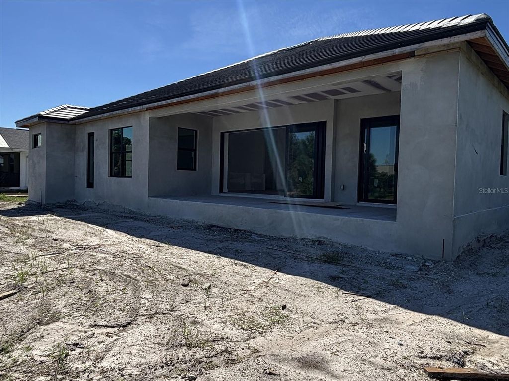 Photo of 215 Bunker Road, Rotonda West, FL 33947 (MLS # O6352684)