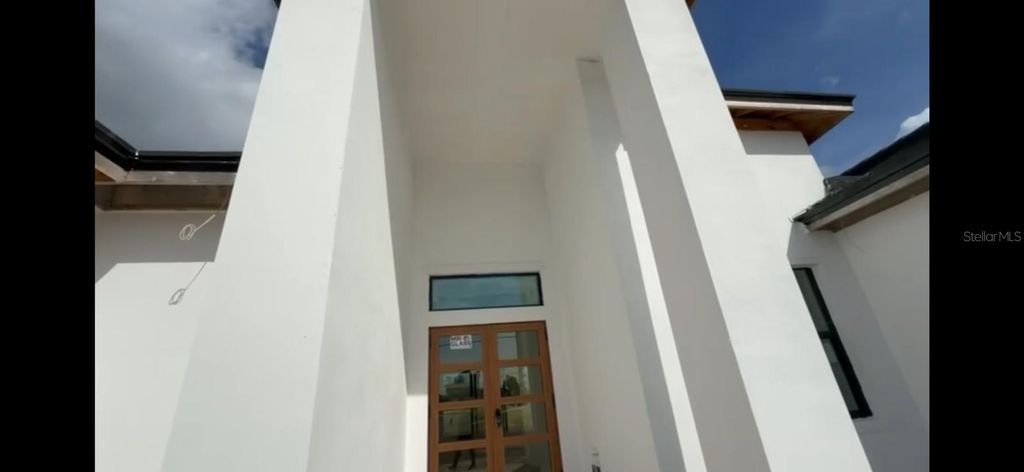 Photo of 215 Bunker Road, Rotonda West, FL 33947 (MLS # O6352684)