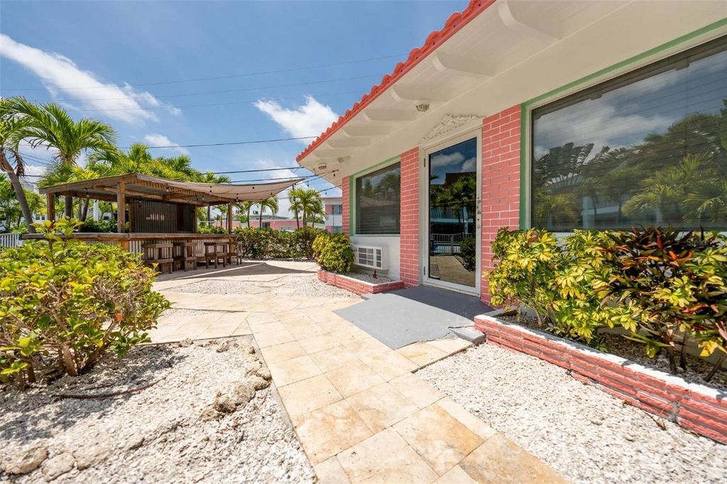 Photo of 333 Hamden Drive, Clearwater Beach, FL 33767 (MLS # TB8363416)