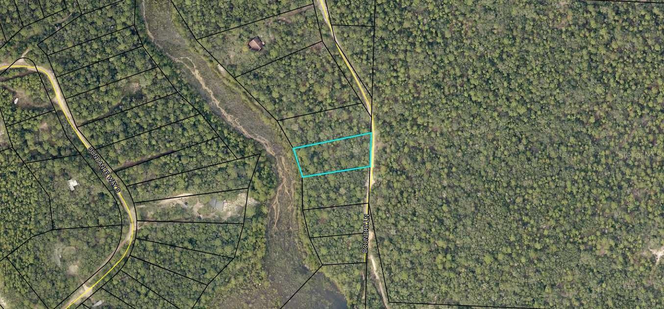 This is an assignment of contract. Nestled along Boundary Lane in Holt, Florida, this .96-acre parcel—spanning 41,818 square feet—offers the perfect opportunity to create your ideal retreat. With no HOA fees, you have the freedom to design the property your way, whether that means building a spacious family home, adding a pool, or including an oversized garage for all your recreational toys. Electricity is available nearby, making the development process even easier.
Holt is a welcoming community known for its peaceful surroundings and small-town charm while still offering convenient access to everything you need. Local schools, such as Baker School, are highly regarded and provide a strong academic environment for families. For everyday necessities, nearby grocery options include Tom Thumb and larger markets just a short drive away in Crestview. When it comes to dining, Holt and the surrounding area feature classic Southern diners, family-owned barbecue joints, and cozy cafes perfect for a laid-back meal.
Life in Holt offers more than just comfort—it’s about embracing the outdoors and enjoying the Florida lifestyle. From fishing and boating in nearby rivers to hiking trails that wind through pine forests, there’s no shortage of recreational opportunities. The community regularly comes together for seasonal events, farmers markets, and local festivals, creating a true sense of hometown connection.
This property’s generous size, prime location, and lack of restrictive covenants make it a rare find. Whether you’re seeking a place to build your forever home, a seasonal retreat, or simply an investment in a growing area, this lot delivers space, privacy, and potential in one of Florida’s most inviting towns.