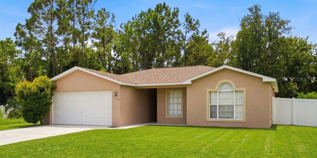 Photo of 930 Derbyshire Drive, Kissimmee, FL 34758 (MLS # S5156815)