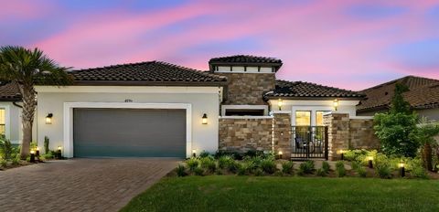 Photo of 4795 Freccia Loop, Wesley Chapel, FL 33543 (MLS # TB8503049)