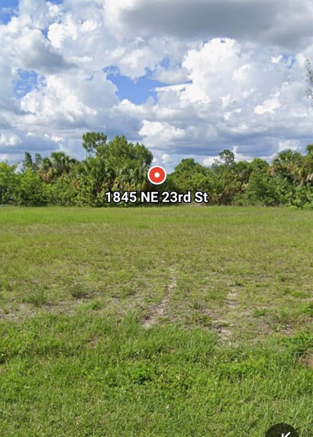 Photo of 1845 NE 23rd Street, Cape Coral, FL 33909 (MLS # O6366212)