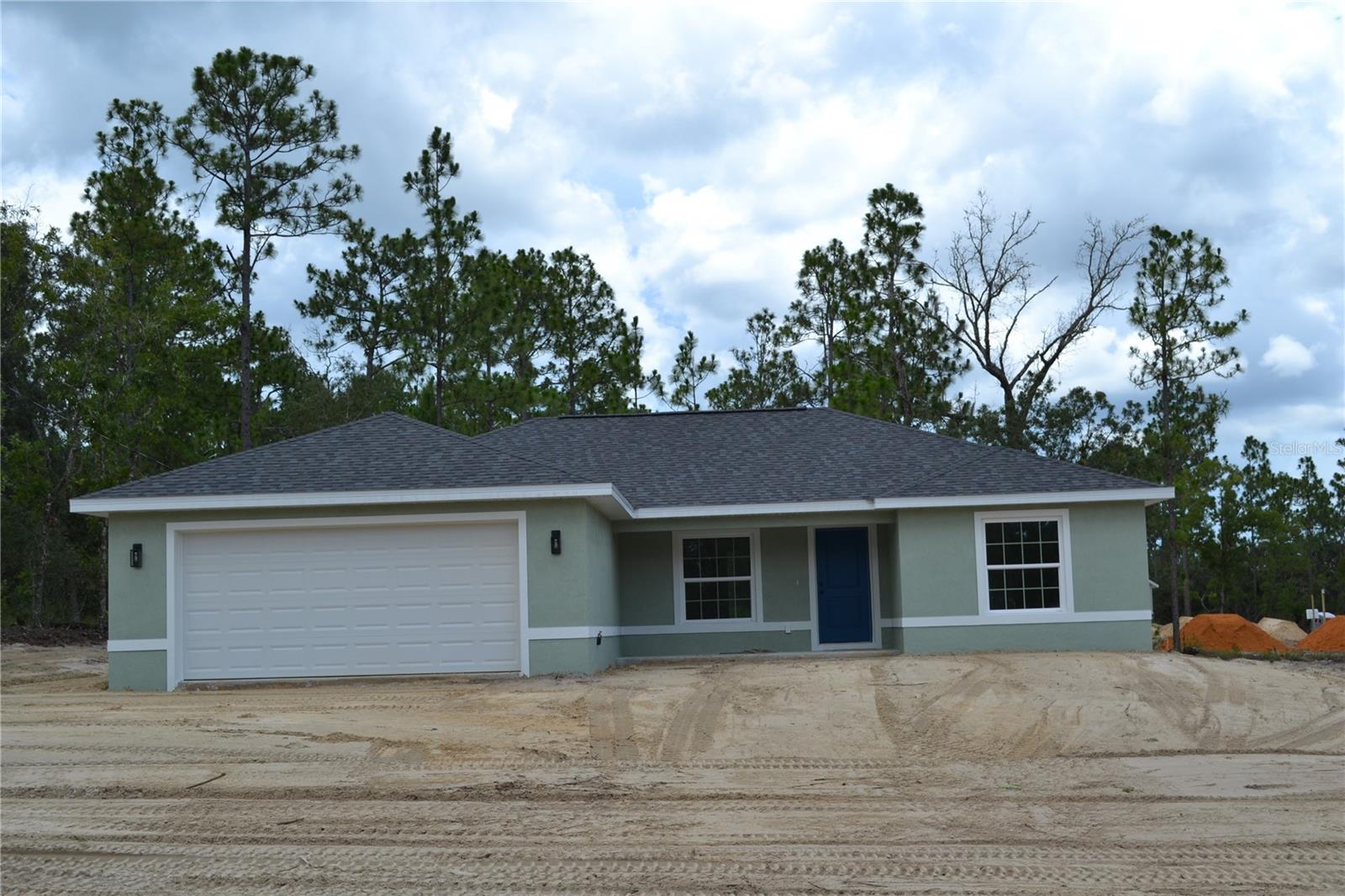 Under Construction. Brand New 3-Bedroom Home with Modern Comforts and Timeless Style
Welcome to this beautifully crafted new construction home featuring 3 spacious bedrooms, 2 full bathrooms, and a 2-car garage. Designed for both everyday living and entertaining, the open-concept layout centers around a bright and airy kitchen, complete with granite countertops, sleek white cabinetry, stainless steel appliances, and a large dining area perfect for gatherings.
The kitchen seamlessly flows into the expansive great room, creating a welcoming space to relax or host guests. Luxury vinyl plank flooring runs throughout the home, adding warmth and durability, while the bathrooms are finished with elegant tile for a touch of sophistication.
Retreat to the private primary suite, which offers a walk-in closet and a stylish ensuite bathroom. The oversized laundry room includes ample storage, making daily tasks more convenient.
Enjoy outdoor living year-round with both a covered front porch and a covered rear lanai—perfect for morning coffee or evening sunsets.
This home combines thoughtful design, quality finishes, and modern convenience—ready for you to move in and enjoy.