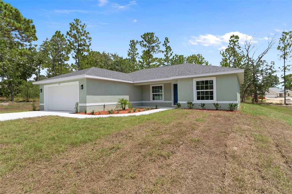 Photo of 6658 N Bedstrow Boulevard, Dunnellon, FL 34434 (MLS # OM704546)