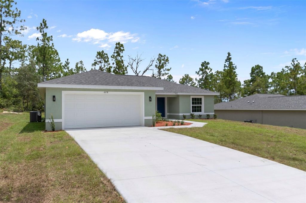Photo of 6658 N Bedstrow Boulevard, Dunnellon, FL 34434 (MLS # OM704546)