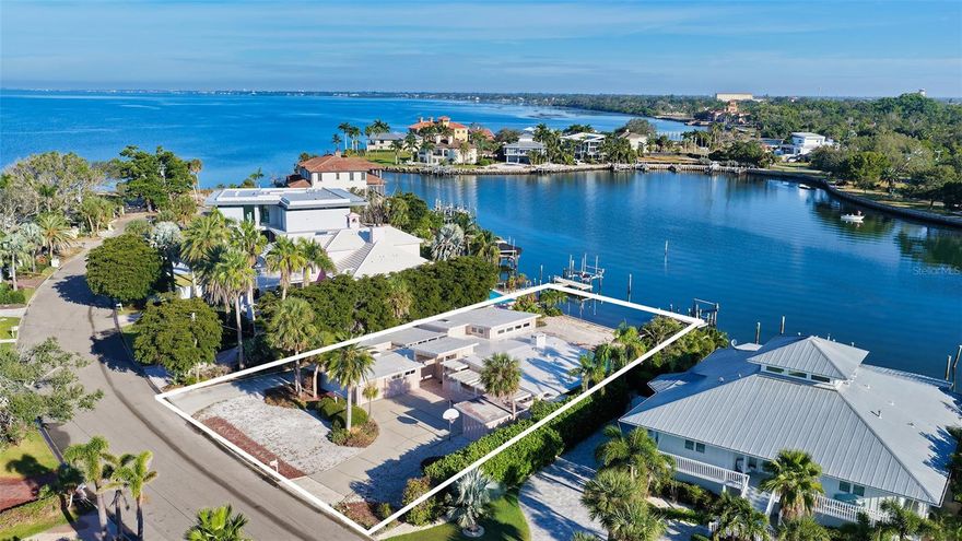 Build Your Dream Home on Sarasota Bay in Sapphire Shores! 
Set on an expansive 0.34-acre (14,665-sq.-ft.) waterfront lot, this property presents a rare opportunity to create a custom Sarasota residence in one of the city’s most desirable West-of-Trail neighborhoods. Perfectly positioned on a protected inlet that opens directly to Sarasota Bay, this oversized homesite offers stunning water views and the ideal setting for a modern coastal estate with private dockage and outdoor living space.
Nestled among multi-million-dollar properties in the sought-after Sapphire Shores community, the location captures both tranquility and convenience. Just minutes from downtown Sarasota, residents enjoy easy access to world-class dining, boutique shopping, cultural landmarks, and vibrant nightlife. Nearby attractions include The Ringling Museum of Art, Sarasota Jungle Gardens, and the Van Wezel Performing Arts Hall, while Lido Beach, Longboat Key, and St. Armands Circle are only a short drive away.
Offering a coveted combination of bay proximity, generous lot size, and prime positioning within Sarasota’s prestigious museum district, this property is ready for new vision—whether you imagine a coastal contemporary retreat or timeless Sarasota modern. Opportunities of this caliber are increasingly rare in today’s market—seize the chance to build your dream home in one of Sarasota’s most storied waterfront enclaves.