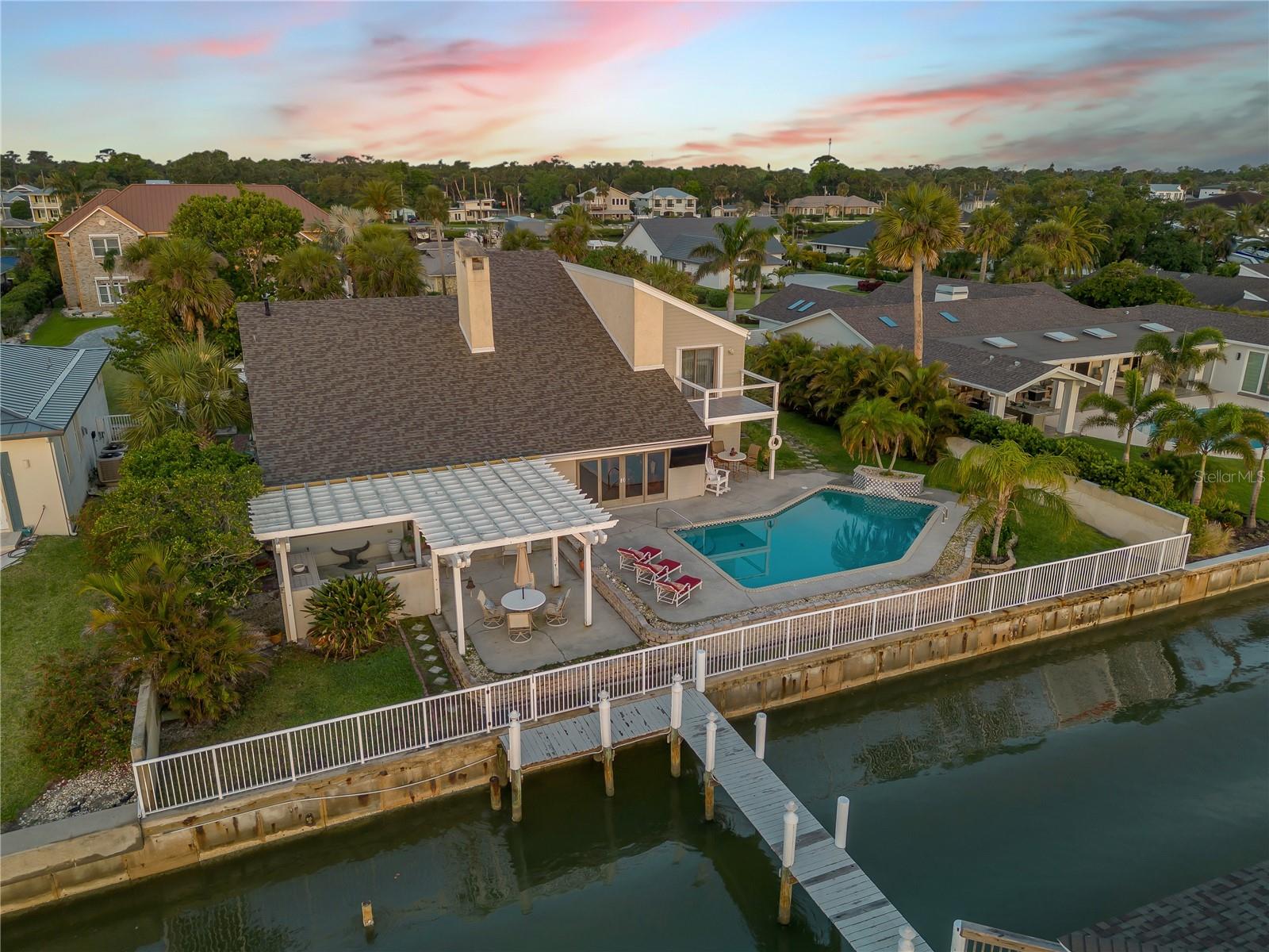 Breathtaking Intracoastal Front Living in Exclusive Yacht Club Island Estates
Welcome to 1219 Commodore Drive, a rare opportunity to own a waterfront sanctuary in New Smyrna Beach's only Intracoastal waterfront gated community, Yacht Club Island Estates in New Smyrna Beach. Situated directly on the Intracoastal Waterway, this property offers unobstructed panoramic views, direct water access, and the tranquil coastal lifestyle you've been dreaming of.
This spacious residence is a canvas for your vision, ready to be renovated and transformed into a luxurious retreat. With generous square footage, expansive windows, and an ideal layout for indoor-outdoor living, the home invites you to design your dream oasis in a truly unbeatable location.
Enjoy peaceful mornings watching the boats go by and evenings filled with glowing sunsets over the water. Whether you envision a modern coastal escape or a timeless traditional masterpiece, the possibilities here are endless.
Don’t miss your chance to own one of the most desirable waterfront parcels in New Smyrna Beach. Private dock potential, deep water access, and minutes to the Atlantic Ocean via Ponce Inlet make this a boater’s dream come true.
Schedule your private tour today and start imagining life at 1219 Commodore Dr—where every day feels like a vacation.