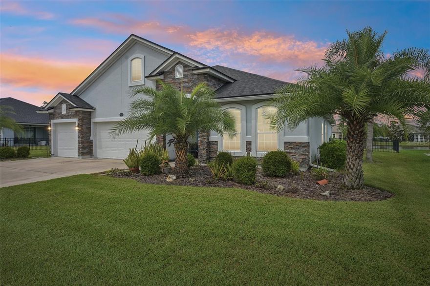 Gorgeous well maintained 3 car garage 4 bedroom 3 full bath home on pond now available! Located in the low HOA neighborhood of Deerfield Meadows in sunny St Augustine FL! Come check out this open floor plan home with beautiful curb appeal, stone accents out front, fully fenced backyard, wide open lot, large Foyer entry with 2 bedrooms and guest bathroom at front of home perfect for guests visiting. As you enter the home you are invited into the large and spacious open floor plan with lots of space for entertaining offering a formal combo living and dining space, all stylish tile flooring throughout the home, gourmet kitchen with built-in wall oven and new upgraded smart technology wifi GE Profile cooktop, tons of space for prepping meals at the California style island offering additional seating with additional space for the everyday table setup! Large open windows and sliding glass doors that hideaway at the screened-in paved back patio! Offers privacy, recessed decorative ceiling with water views of the pond, his and hers closets and separate vanities, walk in shower and separate soaking tub. The final and 4th bedroom is located on the opposite side towards the back of the home with its own bathroom offering total privacy and a walk-in shower. Home comes with a whole house generator, whole house water filtration system connected to the water heater. Electric Awning out back over the exterior paver patio for additional shading! This home is a must see. Fabulous location with low HOA. Minutes to the heart of St. Augustine, Beaches, Medical, Restaurants and a 15 minute drive to Historic St. Augustine area!