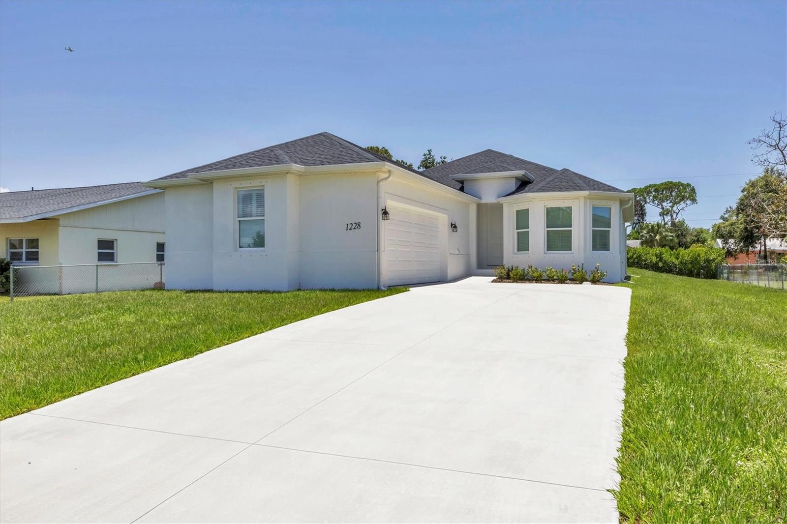 Lovely 3 bedrooms, 2 baths and a side entry 2 car garage. Home has never been lived in and "shows like new!!" Used for a weeks vacation occasionally and that's it! Home is full of upgrades and shows beautifully. Located within minutes to Venice area "Beaches on the Gulf of Mexico" and Historical Downtown Venice! The Intracoastal Waterway is your entry to all your boating luxuries waiting just for you!! Home was built with excellent upgrades throughout and includes hurricane panels for outdoor needs. Enter into nice foyer to great room with coiffured ceilings, crown moldings, upgraded lighting and ceiling fans, home has plantation shutters throughout. Kitchen has large island with room for several stools for casual dining adjacent to dining area and great room with entire back opening to back porch thru 8 ft glass sliders from great room and 6 ft sliders from dining area. Spacious kitchen with beautiful granite counters, matching backsplash on walls, multiple cabinets, kitchen sink is located in Island for your ease and convenience along with dishwasher, electrical outlets and extra storage cabinets! Flooring in home is Luxury vinyl, carpet and tile. Master bedroom is handsomely located off great room and complimented with clerestory window over bed, coiffured ceilings, ceiling fan, plantation shutters and sliding glass doors to large porch. En Suite master bath is beautiful and accommodating with separate luxury tub and large walk in shower w/glass wall, separate water closet, Not to forget the large walk in closet for all your beautiful "Florida Wardrobe!!" Bedrooms 2 and 3 are split to front of home, one with beautiful bay window giving extra lighting inside and architectural beauty from outside. Bath 2 serves both with walk in shower, glass doors, vanity etc., for using ease. Inside laundry room for washer and dryer has laundry sink, shelving, then out to large 2 car garage with side entry with large accommodating driveway for multiple uses. Don't miss this opportunity for a "one of a kind" in this great location! No HOAs, CDDs, fences allowed.