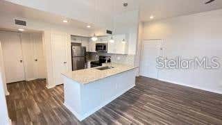 Photo of 7270 Westpointe Boulevard #933, Orlando, FL 32835 (MLS # O6431046)