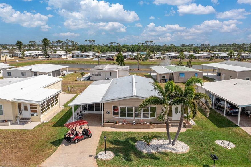 Step into the Florida lifestyle you’ve been waiting for—this charming home is tucked away on a quiet street in a lively 55+ community and is ready for you right now. From the moment you walk in, the bright, open floor plan draws you in, blending the kitchen, dining, and living spaces into one effortless flow that’s perfect for hosting, relaxing, and truly enjoying every day. The kitchen is a standout, offering abundant cabinetry and a cozy eat-in nook that makes mornings feel easy and inviting. Just beyond, the sunlit living area is framed by an entire wall of windows, filling the home with warmth and natural light you’ll appreciate year-round. Need extra space? The Florida room delivers—ideal for entertaining, unwinding, or even accommodating overnight guests as a flexible third sleeping area. The primary suite is your private retreat, complete with dual closets and a beautifully upgraded ensuite bath featuring a spacious walk-in shower and built-in bench. Guests will feel completely at ease in their own inviting bedroom paired with a stylishly updated bathroom. This home isn’t just beautiful—it’s move-in ready, fully furnished with key updates already done for you, including a newer water heater, updated appliances, and a 2023 A/C system.
And the lifestyle? That’s where this property truly shines. Set within La Casa, a sought-after community surrounded by mature trees, scenic lakes, and wide-open green spaces, you’ll enjoy resort-style amenities like pools, hot tubs, and vibrant social areas—all in a peaceful, well-maintained setting. Perfectly positioned between Sarasota and Fort Myers, you’re close to everything—shopping, golf, beaches, boating, and more—while still enjoying a laid-back Gulf Coast pace. Homes like this don’t last—especially in a community this desirable. If you’ve been waiting for the right opportunity to embrace Florida living, this is it.