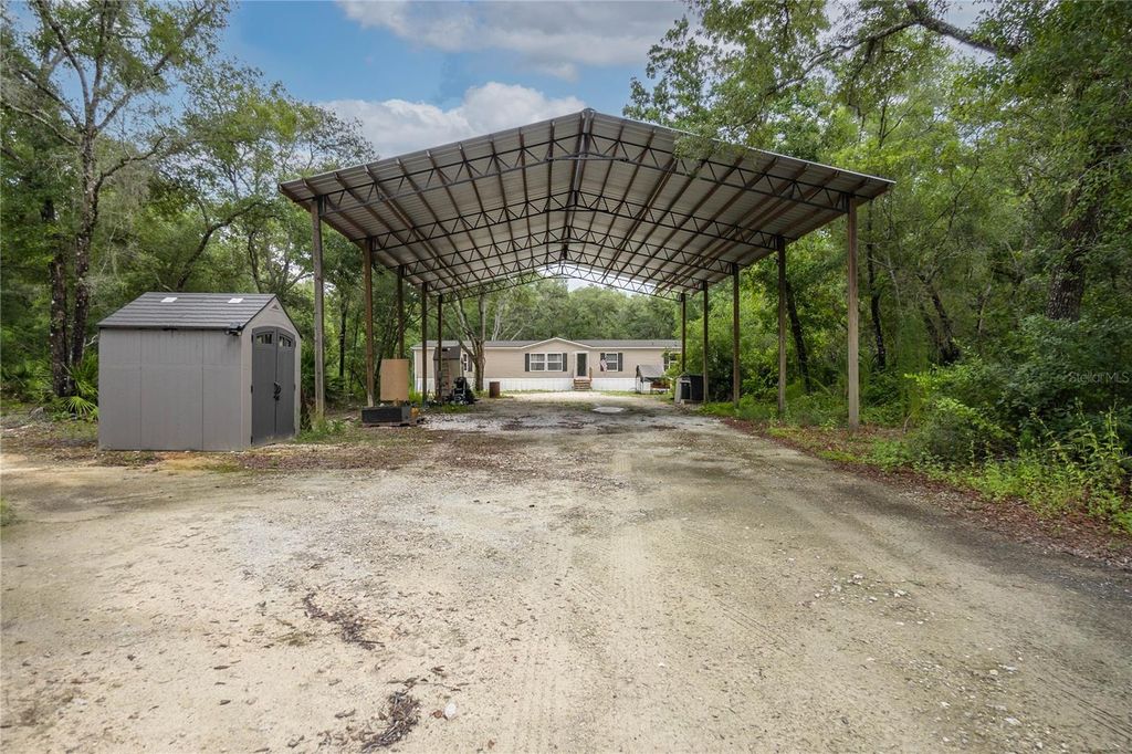 Photo of 6783 N Tamarind Avenue, Hernando, FL 34442 (MLS # OM715587)