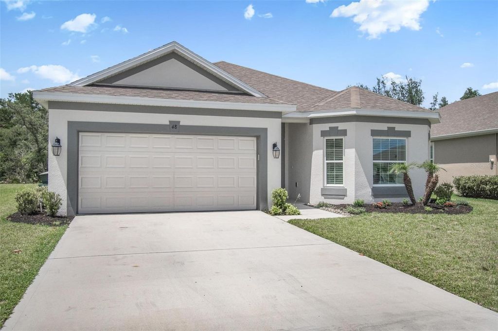 Photo of 48 Oakleaf Way, Palm Coast, FL 32137 (MLS # FC317708)