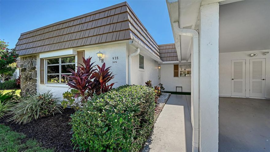 Welcome to Strathmore Riverside Villas, a vibrant 55+ community perfectly situated in the heart of Sarasota. This spacious two-bedroom, two-bath villa offers the ideal blend of comfort, convenience, and endless potential. Light, bright, and airy, the home features an open-concept layout with generous room sizes and an inviting flow throughout. The enclosed lanai, complete with both windows and screens, provides a wonderful year-round living space; perfect for morning coffee, relaxing afternoons, or entertaining friends. The villa also includes a one-car carport and a separate storage and laundry area, offering privacy, security, and plenty of extra space. With just a touch of personalization, this residence can truly shine. The community itself is beautifully maintained and lushly landscaped, creating a serene and welcoming atmosphere surrounded by green space. Strathmore Riverside Villas is known for its active lifestyle and warm sense of community. Residents enjoy a wealth of amenities, including a heated geothermal pool overlooking the marina, clubhouse, fitness center, library, meeting rooms, sauna, and billiards. There’s always something happening here; social events, card games, bingo nights, potlucks, concerts, dancing, and more. Boat docks are available on a first-come, first-served basis for just $1,344 per year, and the community is pet-friendly. The location couldn’t be better; just minutes from shopping, hospitals, and the world-famous Siesta Key Beach, as well as the rich cultural attractions of downtown Sarasota, including opera, ballet, symphony, and live theatre. Whether you’re looking for a full-time residence or a seasonal getaway, this villa lives like a single-family home and offers the perfect opportunity to enjoy Florida’s relaxed coastal lifestyle. Don’t wait; schedule your private tour today and discover the charm of Strathmore Riverside Villas.