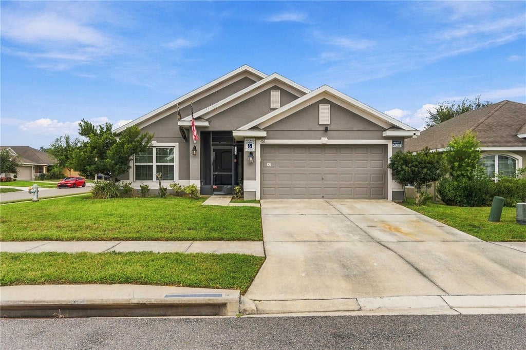 Photo of 796 Meadow Pointe Drive, Haines City, FL 33844 (MLS # O6447134)