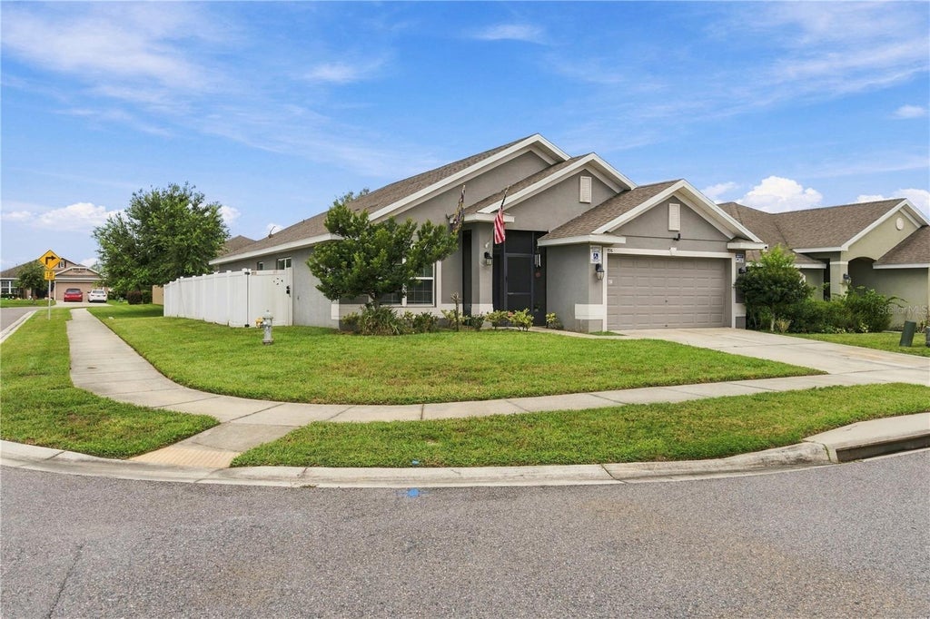 Photo of 796 Meadow Pointe Drive, Haines City, FL 33844 (MLS # O6447134)