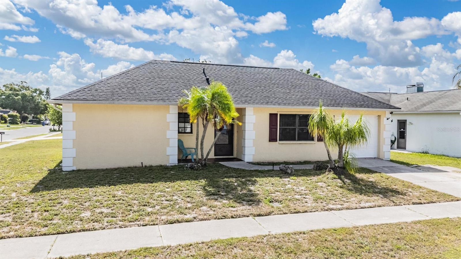 Charming Corner Lot Home with Room to Grow!
Welcome to this updated 2-bedroom, 1-bath, 1-car garage home nestled on a spacious corner lot in Holiday. Featuring a newer shingle roof (2022) and a brand-new AC system (2023), this home is move-in ready with great potential. The bright, remodeled kitchen boasts white Shaker wooden cabinetry, granite countertops, and opens to the dining area with French doors leading to a screened back porch—perfect for relaxing or entertaining. The open-concept dining and living room create an inviting space, while the hallway provides access to a convenient laundry room, linen closet, full bath, and both bedrooms. Enjoy the expansive level backyard—ideal for a pool, garden, play area, or future expansion. Whether you're starting out or downsizing, this home offers comfort, value, and opportunity!