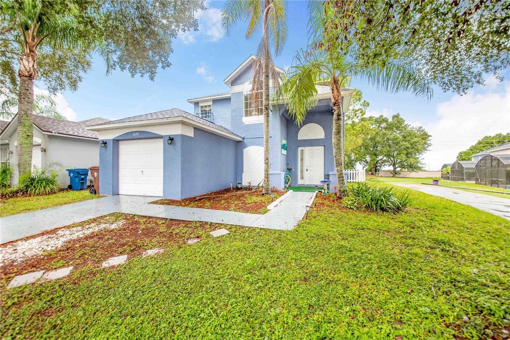 Photo of 2698 Hemingway Ave, Haines City, FL 33844 (MLS # P4940138)