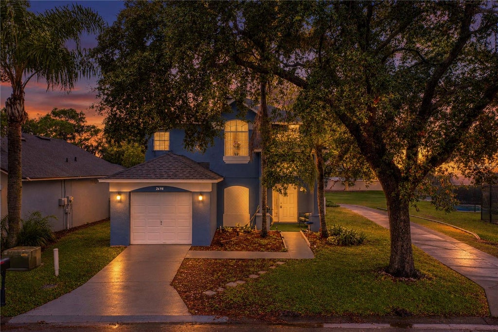Photo of 2698 Hemingway Ave, Haines City, FL 33844 (MLS # P4940138)