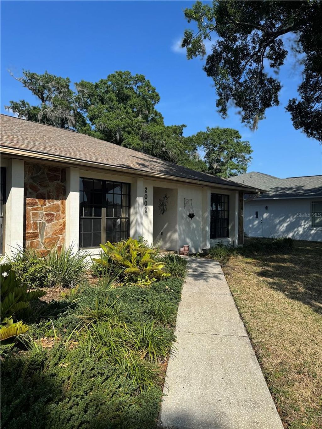 Photo of 2002 E Timberlane Drive, Plant City, FL 33563 (MLS # O6403509)