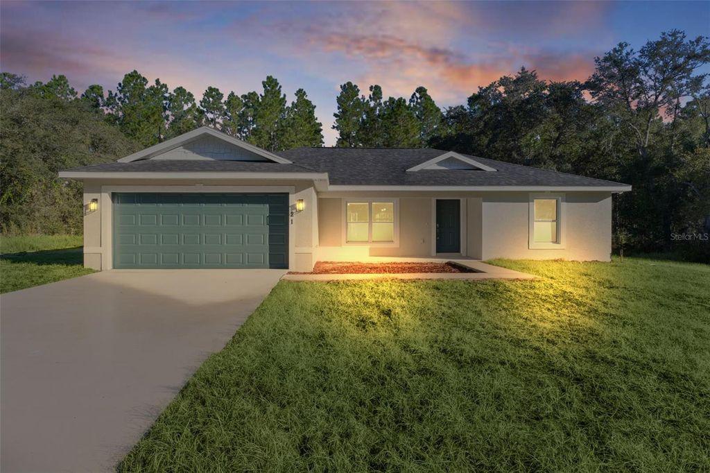 Photo of 21 Malauka Pass Trail, Ocklawaha, FL 32179 (MLS # G5103398)