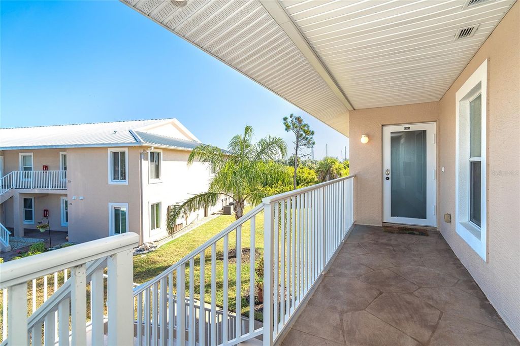Photo of 9700 Fiddlers Green Circle #219, Rotonda West, FL 33947 (MLS # C7517589)