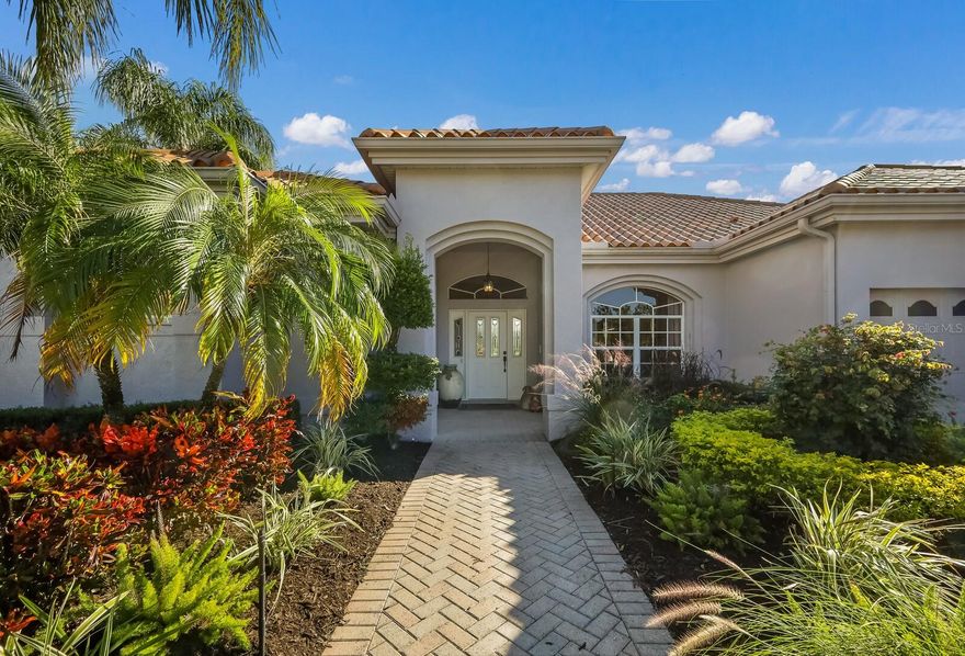 Wonderful golf and water views of the seventh hole on the Player course in Beautiful Laurel Oak Estates. This three bedroom three bath home is now available for sale. The property has a paver brick driveway, with a full two car garage as well as a golf cart garage. Newer vinyl flooring covers all of the living area as well as the two guest bedrooms. The office area shares the golf and water views and has plenty of room for a Murphy bed for additional guests if needed. The lanai offers paver bricks surface and a nice covered area for your dining and entertaining pleasure. Laurel Oak Country Club has two 18 hole golf courses and a wonderful tennis and pickleball courts. A separate membership is required.