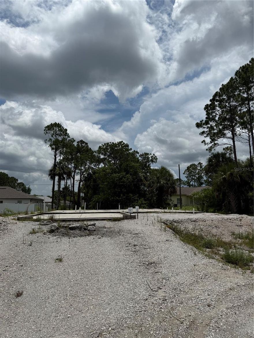 Build your dream home on this 0.23-acre vacant residential lot located in the growing community of Port Malabar Unit 36 in SW Palm Bay. The property features approximately 80 feet of paved road frontage and includes a 4-inch poured concrete slab, offering a head start on future construction or storage. With a quiet, tree-lined setting and no HOA, this lot provides flexibility and privacy in a well-established neighborhood. The area is serviced by well and septic, with new construction taking place throughout the community. Conveniently located near Bayside Lakes, schools, shopping, and major roadways—this is an ideal opportunity for investors or future homeowners seeking value in a rapidly developing area.