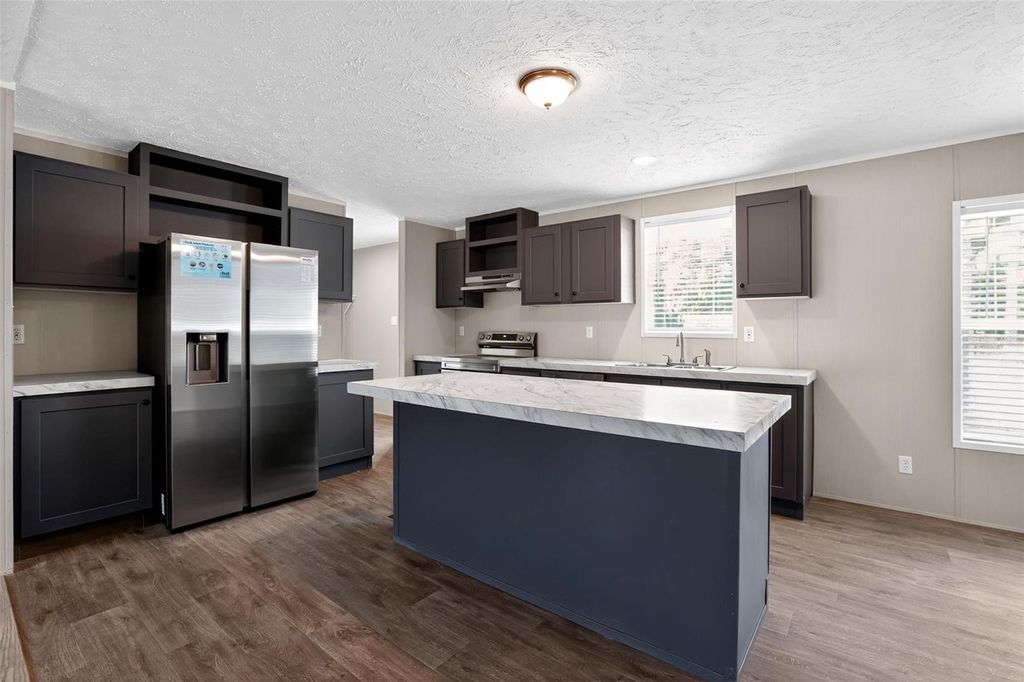 Photo of 3013 Rossi Lane, Lakeland, FL 33801 (MLS # O6340050)