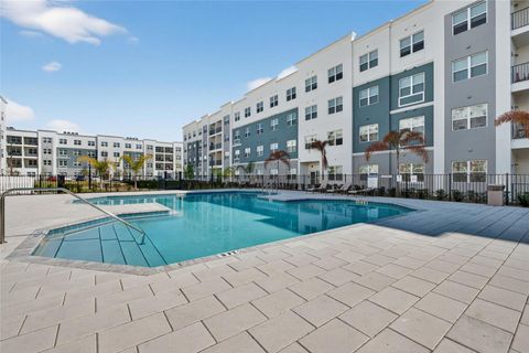 Photo of 1230 Southstation Place #311, Orlando, FL 32809 (MLS # O6382569)