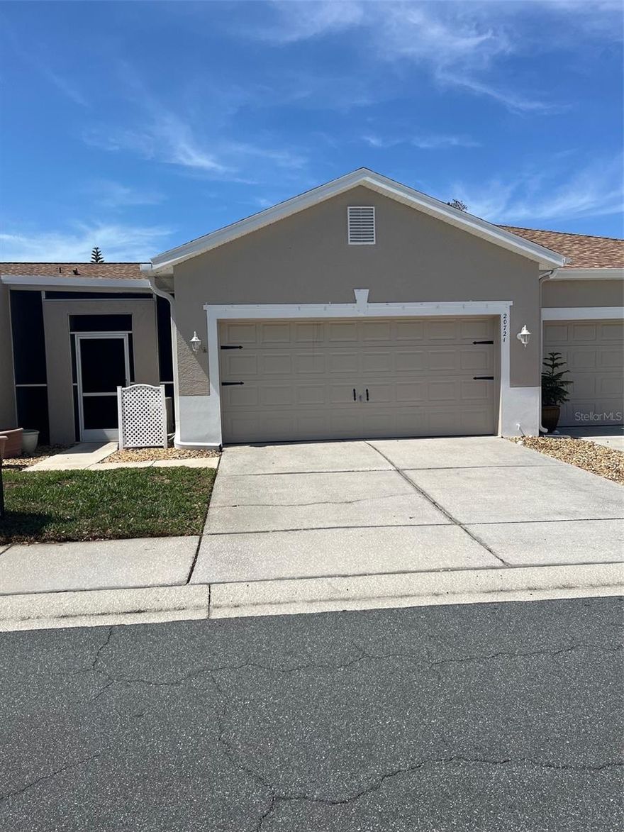 WELCOME HOME TO THIS 2BED/2BATH/2 CAR GARAGE WITH NO REAR NEIGHBORS "" GET AN EXTRA ROOM WITH THE ENCLOSED FRONT ENTRANCE WITH CUSTOM ROOF AND FLOORING"  KITCHEN HAS ALL APPLIANCES,  LAUNDRY ROOM HAS WASHER AND DRYER.  CARPET THRU OUT IS LESS THEN 1 YEAR OLD, ALL FANS ARE NEW, LANAI HAS NEW FLOORING , SLIDER HAS NEW CUSTOM WINDOW COVERING. THIS HOME IS READY TO MOVE INTO.  "HOA COVERS (roof, paint outside, cable and internet, lawn care,all clubhouse facilities.  THE GROVES IS AN ACTIVE ADULT GOLF COURSE GATED COMMUNITY,  WITH A PUBLIX SHOPPING CENTER RIGHT OUTSIDE THE GATES.