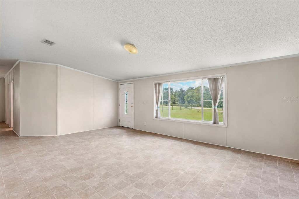 Photo of 13317 Moon Road, Brooksville, FL 34613 (MLS # TB8536741)