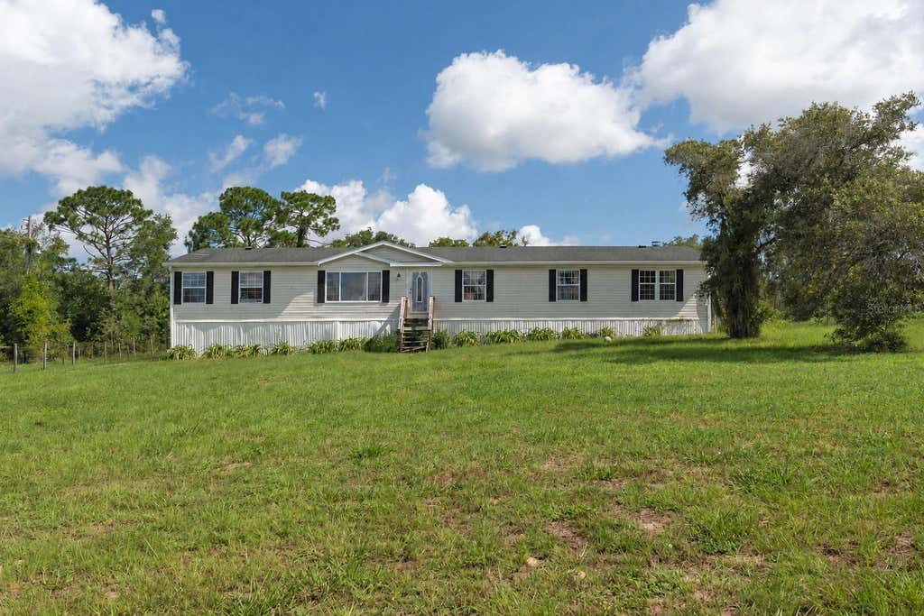 Photo of 13317 Moon Road, Brooksville, FL 34613 (MLS # TB8536741)