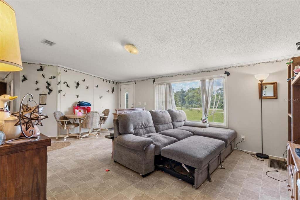 Photo of 13317 Moon Road, Brooksville, FL 34613 (MLS # TB8536741)