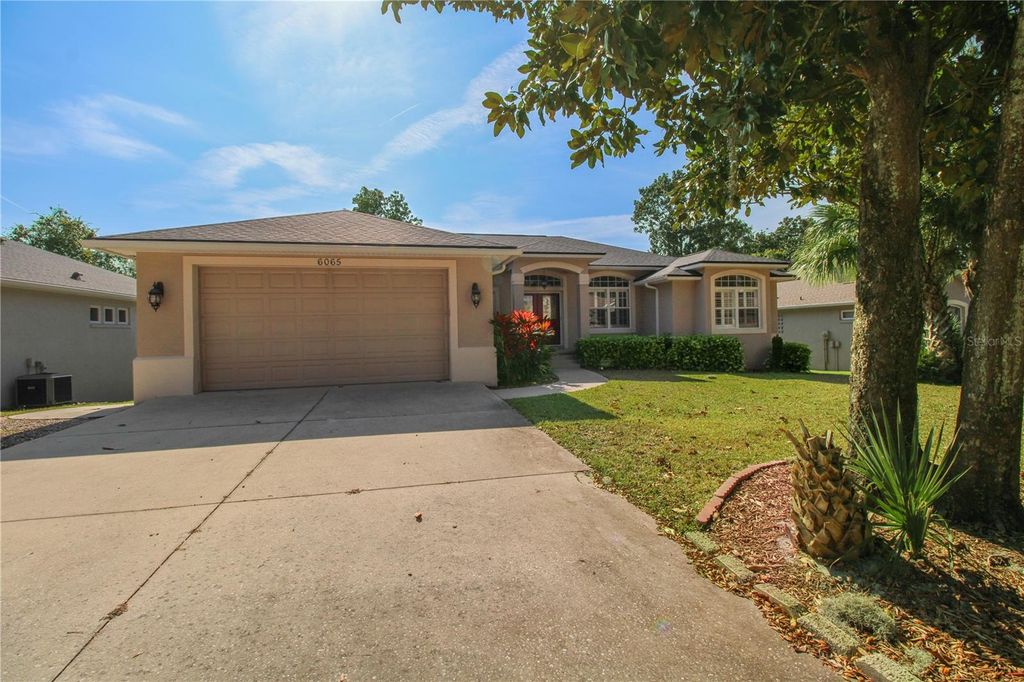 Photo of 6065 Spruce Point Circle, Port Orange, FL 32128 (MLS # O6367469)