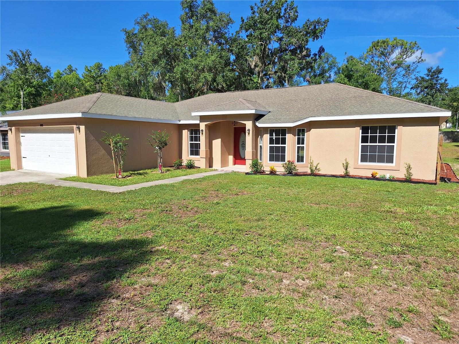 3BR/2BA/Office Den/2 GA 1/2 Acre Covered Rear Patio Deck 15125 Carolina Dove Rd, Brooksville, FL 34614-1623, United States I Come See this Adorable family home in the desirable Royal Highlands neighborhood Enjoy your gorgeous and spacious fully remodeled open floor plan 3BR plus Office/Den 2BA 2 Car garage home tastefully done with a eat in breakfast nook, breakfast bar and indoor laundry room. Home has large open floor plan with high taised ceilings offering views from kitchen, living room, bedrooms and office / den combo. This home offers privacy & no build conservation lots across street on your 1/2 acre lot. Access to suncoast trail is less than 1 minute close ditance from home, where you can jog or bike on this 34 mile trail from your home. Fully remodeled interior with new upgraded 22 mil Luxury Vinyl Plank Flooring & custom 5 1/4'' colonial baseboards throughout entire home. Custom ceramic plank tile installed in front entrance foyer as you enter home and also installed in both bathrooms & laundry room Office/Den has double full glass french doors and single full glass door and 3 bay windows allowing for plenty of light and views througout your home. Home has large outdoor covered porch overlooking large backyard with new cool deck finish intalled that's great for enjoying a peaceful cup of morning coffee or outdoor grilling or enjoying cool evening breezrs. Primary Bedroom is 20x18 giving you plenty of room for larger furniture, a sitting area or additional office and MBR bedroom also boasts a large walk-in closet. Bedrooms 2 and 3 are also larger than average with large oversize closets. Enjoy your amazingly large Kitchen that has custom raised ceilings & led lights that highlight your upgraded granite counters. Custom Chef's dream kitchen with 42'' light solid wood shaker cabinets with soft close draws offering huge amounts of storage space There is a eat in kitchen sitting area and a kitchen pantry closet and 2 linen closets outside guest bathroom. Bathrooms have custom solid wood light shaker cabinets, new fixtures and mirrors MBR Shower high end remodel with new fixtures, soft close custom shaker cabinets, granite, walk in shower and large soaking tub. MBR Vanity has his & her sinks with a large custom mirror. Home plumbing connections all installed with new valves and stainless steel water lines. Home has upgraded granite counters and fixtures in kitchen and both bathrooms. New knockdown texture and fresh paint on all walls and ceilings New Stainless Steel appliances with SS microwave mounted above stove and a full size Stainless Steel XL refrigerator to store your home cooked meals. New fans & lighting fixtures throughout your home New window screens installed on all windoes NO HOA on .50 mol acres gives you plenty of to spread out, plant a garden, install a pool, build a workshop. Weeki Wachee Water Park, Publix Shopping Center & Restaurants. Weeki Wachee Middle School & High schools 5 mins away Bedroom 2 Dimensions - 14x12 Bedroom 3 Dimensions - 14x12 Dining Room Dimensions - 14x14 Kitchen Dimensions - 16x15 Living Room Dimensions - 17x15 Master Bedroom Dimensions - 18x20 Home passed 4 point inspection transferrable to new homeowner.