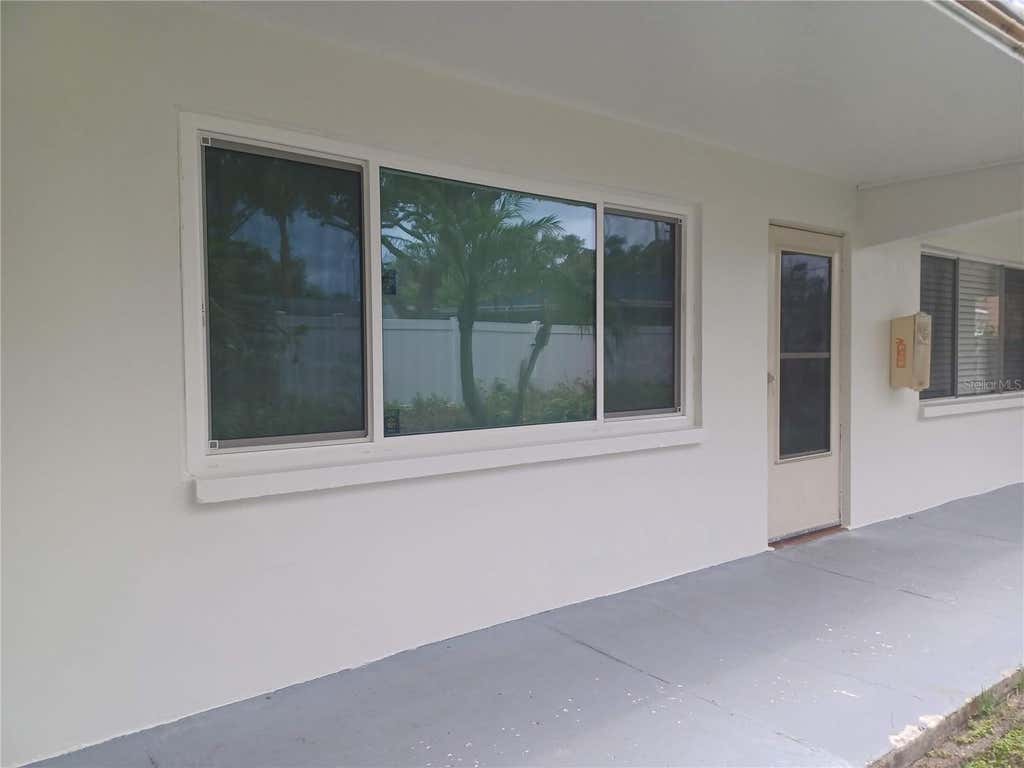 Photo of 2525 W Bay Drive #A12, Belleair Bluffs, FL 33770 (MLS # TB8539853)