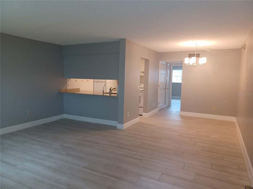 Photo of 2525 W Bay Drive #A12, Belleair Bluffs, FL 33770 (MLS # TB8539853)